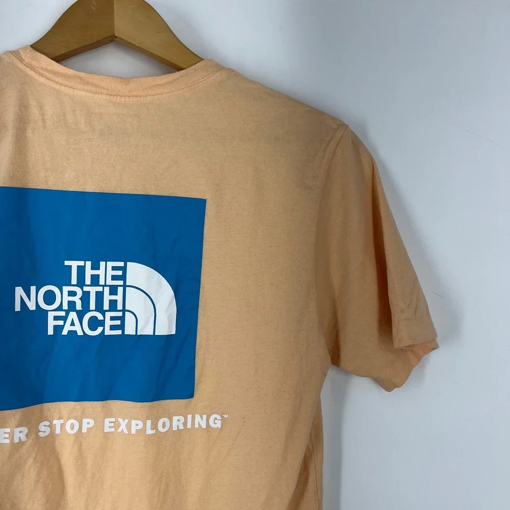 The North Face Mens Peach Graphic Short Sleeve T-Shirt Blue Box Logo Size‎ S